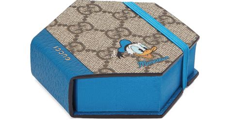 block notes disney x gucci|Gucci Disney x Gucci Donald Duck Hexagonal Sticky Notes.